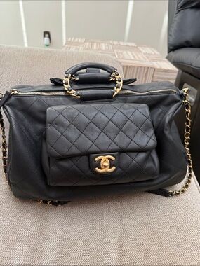 Pre owned luxury CHANEL Black Quilted Leather Satchel